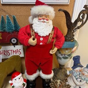 Festive Santa Claus Figurine in Red Outfit